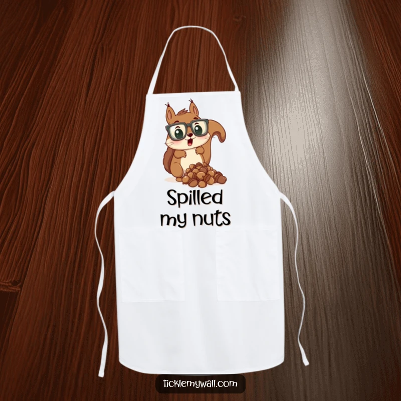 Funny apron showing a surprised squirrel wearing oversized glasses dropping acorns, ideal for kitchens.