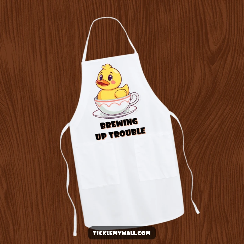 Funny Rubber Ducky Teacup Apron: A surprised rubber ducky floating in a teacup, a humorous kitchen accessory.