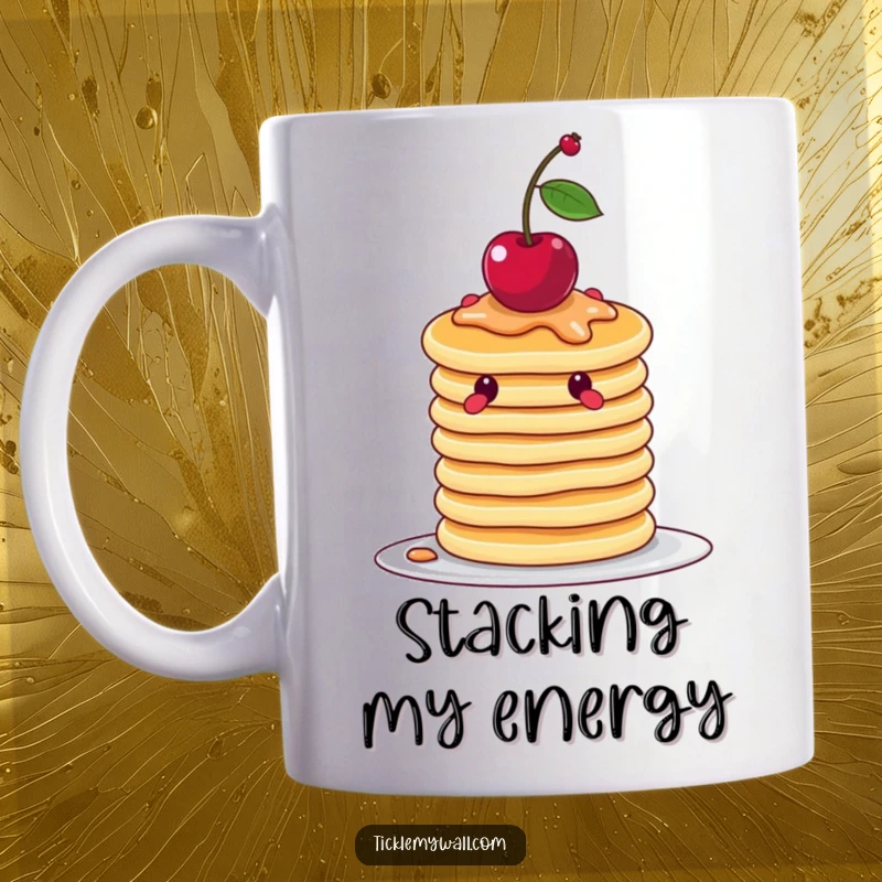Funny wobbly stack of pancakes attempting to balance a cherry, depicted on a mug for humorous breakfast enjoyment.