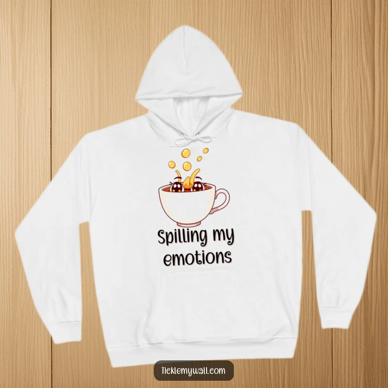 Funny joyful teacup with eyes spilling tea dramatically on a warm fleece hoodie.
