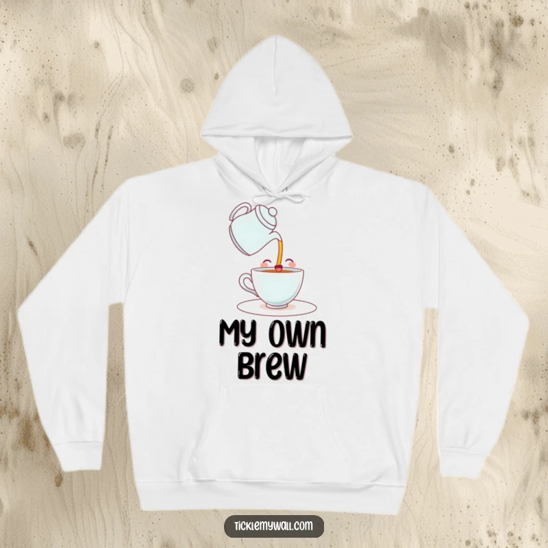 Funny hoodie with a happy teacup character comically pouring itself a drink from a teapot. Cozy and full of independent spirit.