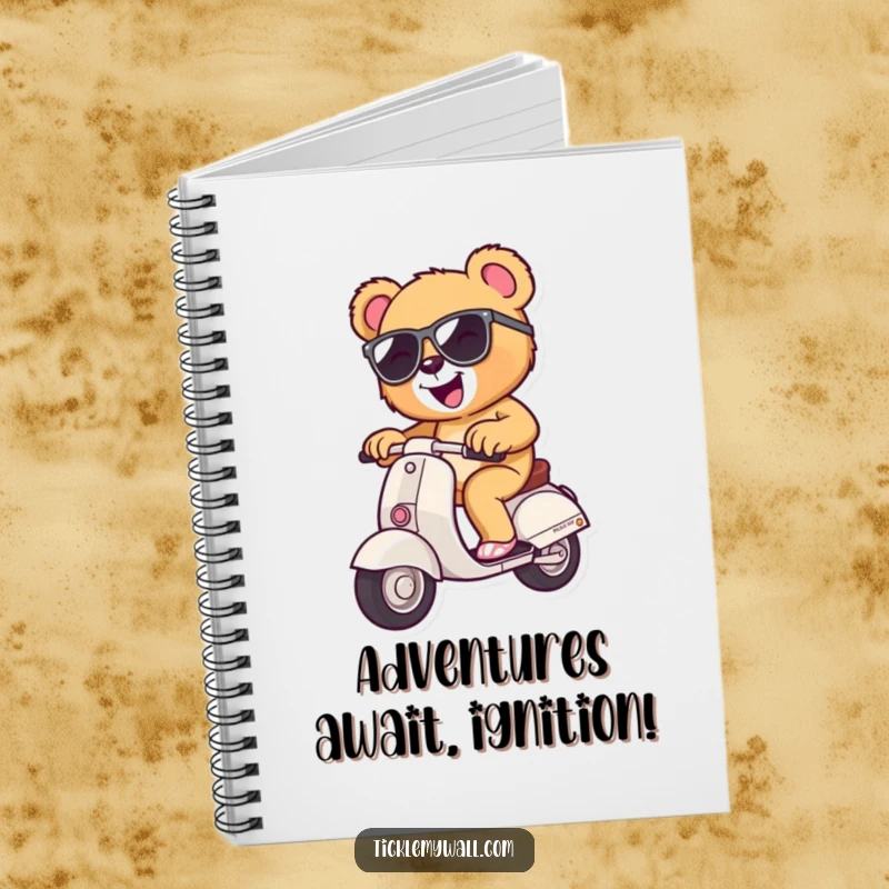 Funny teddy bear with sunglasses riding a miniature scooter, lined notebook for writing and drawing, humorous stationery.