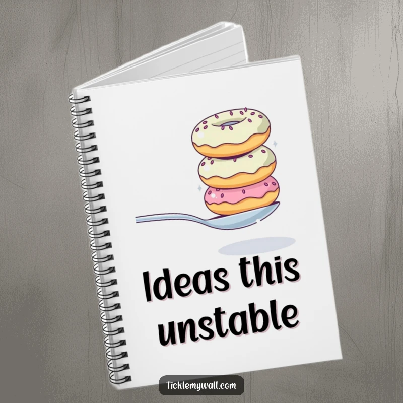Funny notebook cover illustration of a wobbly donut stack hilariously balancing a spoon, designed for humorous note-taking and journaling.