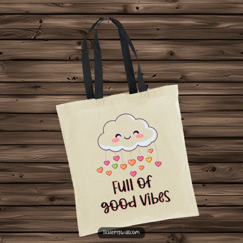 Funny tote bag with a smiling cloud showering down small, colorful, bouncing heart symbols, perfect for carrying essentials happily.